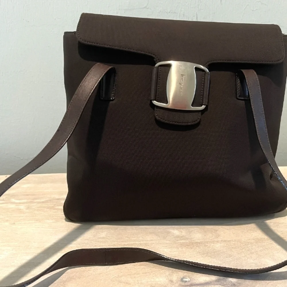 Luxurious Salvatore Ferragamo Vara Shoulder Bag in Dk Brown Nylon & Leat…